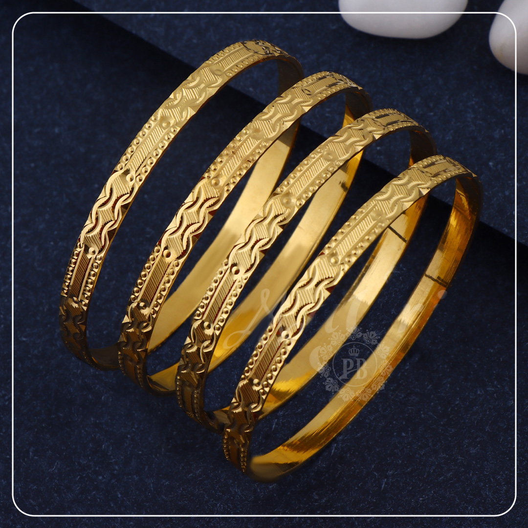 Waves of Tradition Gold Bangle