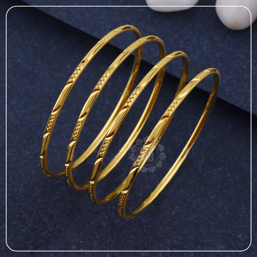 Set of Delicate Gold Plated Bangles with Etched Detailing