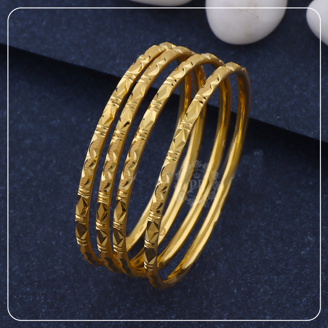 Vedhika Carved Gold Bangles